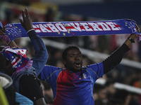 Cape Verdean fan waving a scarf during the Portugal vs Serbia friendly football match at Antonio Coimbra da Mota stadium in Estoril, outskir...