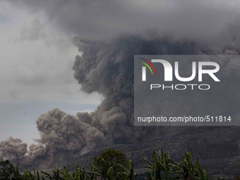Sinabung spewed volcanic material with heat clouds headed south as seen from the village of Three Kicat in Karo, North Sumatra, Indonesia, A...