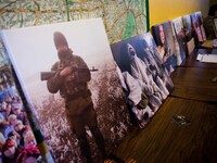 Photos taken by Graham Phillips from eastern Ukraine seen in the event before being autioned. - Pro Russian British journalist Graham Philli...