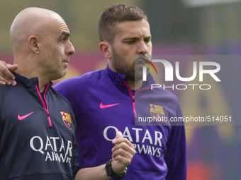 Barcelona, Spain. 2015 April 4. The defender Jordi Alba with one of the doctors coaches of FC Barcelona, during the training session of Apri...