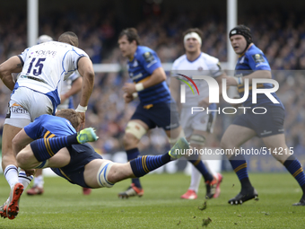 Leinster's Jordi Murphy tacles Bath's Anthony Watson (in action) during European Champions Cup Quarter-Final meeting between Leinster Rugby...