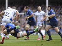 Leinster's Jordi Murphy tacles Bath's Anthony Watson (in action) during European Champions Cup Quarter-Final meeting between Leinster Rugby...