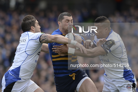 Leinster's Rob Kearney challenged by Bath's Horacio Agulla (Left) and Anthony Watson (Right) during European Champions Cup Quarter-Final mee...