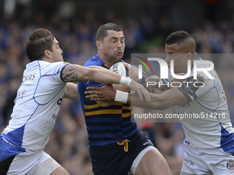 Leinster's Rob Kearney challenged by Bath's Horacio Agulla (Left) and Anthony Watson (Right) during European Champions Cup Quarter-Final mee...