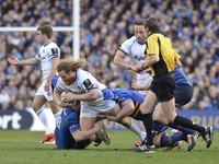 Bath's Ross Batty in action challenged by Leinster's Jordi Murphy (Right) and Marty Moore (Left), during European Champions Cup Quarter-Fina...