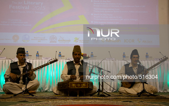 SRINAGAR, INDIAN ADMINISTERED KASHMIR, INDIA -APRIL 07: Kashmiri singers perform with the traditional musical instruments during a function...