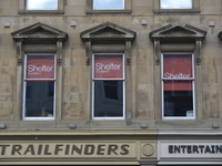 Light shining on the windows of the offices of Shelter in Glasgow on Saturday 11th April 2015. (