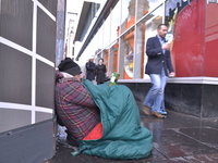 Bogdan living rough on a street in Glasgow, with only a small grasp of English during Saturday 11th April 2015. (