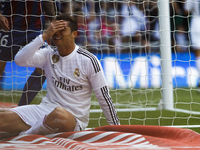 SPAIN, Madrid:Real Madrid's Portuguese forward Cristiano Ronaldo laments a missed opportunity during the Spanish League 2014/15 match betwee...