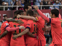 Players of Barcelona celebrate after scoring 1-0 during the match of La Liga (BBVA) between Sevilla FC and FC Barcelona at the Ramon Sanchez...
