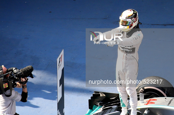 (150412) -- SHANGHAI, April 12, 2015 () -- Mercedes AMG driver Lewis Hamilton of Britain celebrates after winning the Chinese Formula One Gr...