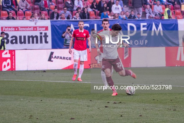 April 11, 2015: Cristian Sapunaru #22 the team captain of Rapid Bucharest  in action during the Liga I game between  FC Dinamo Bucharest ROU...