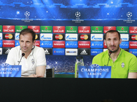 Massimiliano Allegri and Giorgio Chiellini during the prress conference  on the eve of the Champions League match between Juventus FC and AS...