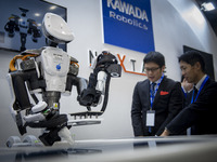 Humanoid robot stands on display at the International Robot Exhibition 2019 at the Tokyo Big Sight on December 18, 2019 in Tokyo, Japan. The...
