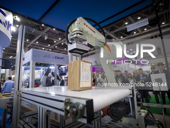 Industrial robot giant stands on display at the International Robot Exhibition 2019 at the Tokyo Big Sight on December 18, 2019 in Tokyo, Ja...