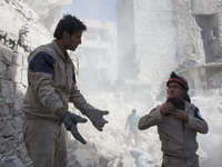 Syrian Regime Forces stage a barrel-bomb strike, in Aleppo, on April 14, 2015. (