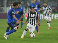 Carlos Tevez in action during the Champions Luague match between Juventus FC and AS Monaco at the Juventus Stafium of Turin  on april 14, 20...