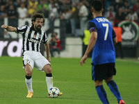 Andrea Pirlo and Nabil Dirar during the Champions Luague match between Juventus FC and AS Monaco at the Juventus Stafium of Turin  on april...