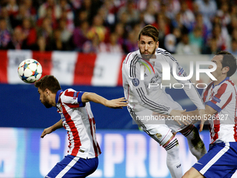 SPAIN, Madrid:Atletico de Madrid's Uruguayan Defender Diego Godin and Real Madrids Spanish Defender Sergio Ramos during the Champions League...