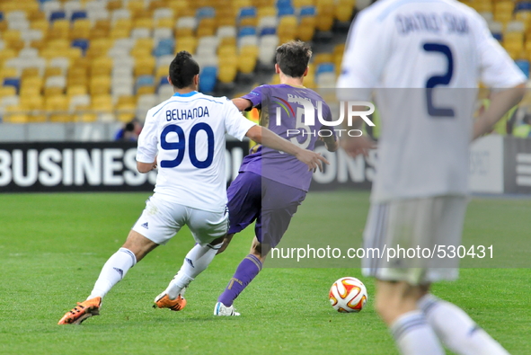 Belhanda of Dynamo Kiev ( L ) and Milan of Fiorentina ( L) battle for during at the Olympic Stadium in the first leg of the quarterfinals of...