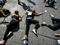 Students clash with riot police during a demonstration demanding the government to improve the quality of public education in Santiago on Ap...