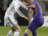 Stefan Savic (L) of Fiorentina vies for the ball with Andriy Yarmolenko (L) of Dynamo during the UEFA Europa League quarter final first leg...
