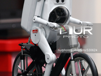 Murata Manufacturing Co Ltd's bicycle-riding robot 