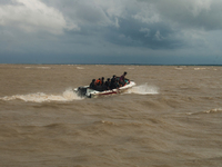 Navy divers are looking for the missing passenger of sunken passenger vessel Pinak - 6 at Padma river near Mawa Ferry ghat, Dhaka, 4 August...