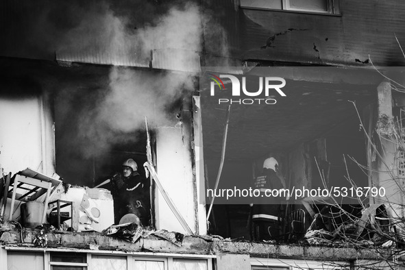 (EDITOR'S NOTE: Image was converted to black and white) A deadly blast killed two people in a block of flats in Varna, some 450 km to the Ea...