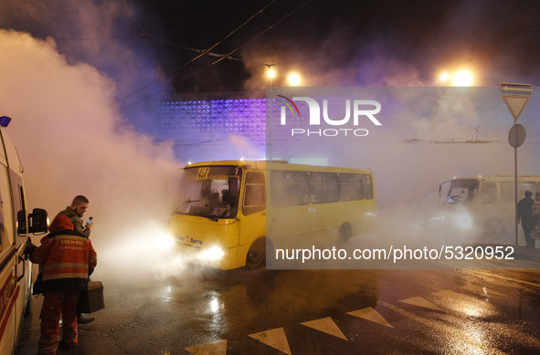A bus with people rides near a place where a central heating pipe breakthrough in the central district of Kyiv, Ukraine, on 13 January, 2020...