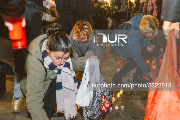 Irainian people lights candle in Cologne, Germany, on 14 January 2020 during the protest  over the shooting down at Tehran of Ukrainian Airl...