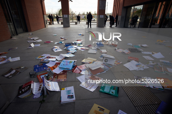 High school teachers gathered in front of the Board of Education of Haute Garonne. They throwed old schoolbooks in the backyard of the Board...