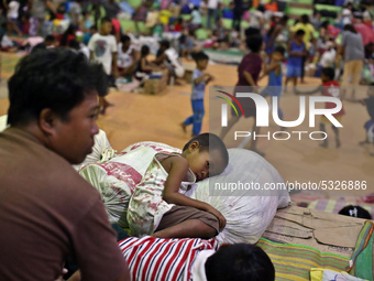 Evacuees take shelter in an temporary evacuation center in Batangas, Philippines, on January 15, 2020. Some people refuse to be evacuated fr...