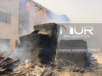 Part of the planks razed by fire, at the popular timber market in Mushin, Lagos January 25, 2020. There have been no casualties reported, an...