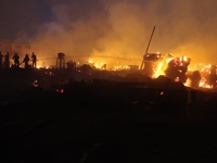 Fire burns Amu Plank Market in Mushin area of Lagos, Nigeria on Saturday Jan 25, 2020. Fire fighters have not been able to put out the fire...