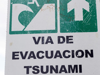 Signage with Evacuation route in case of tsunami pictured in Puerto Aisen (Aysen), Patagonia, Chile on 17 December, 2017. Puerto Aisén is a...