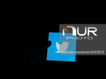 In this photo illustration the Twitter   logo is seen displayed on smartphone screen (