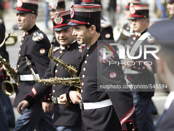 Musicians from the honor guard leave the Vittorio Emanuele monument after a  ceremony to mark the anniversary of the liberation day in Rome...