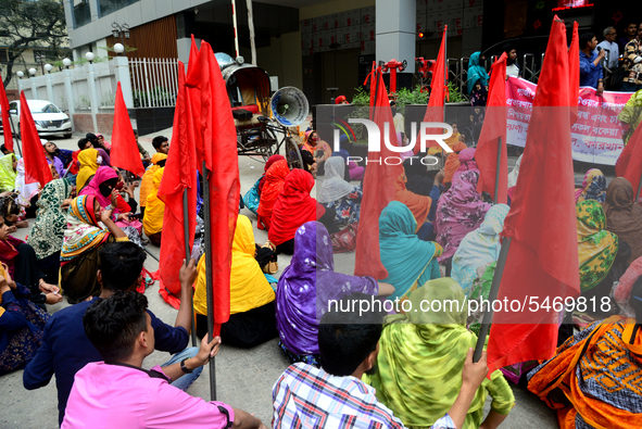 Garments workers of Jharna Knitwear Limited stage a demonstration in front of Department of Labor building demanding their due payment and e...