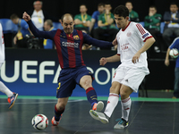 Barcelona's forward Wilde (L) vies for the ball with Kairat's defender Douglas (R)  during the UEFA Futsal Cup, final match between Kairat A...