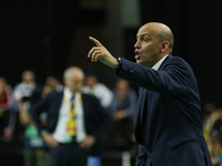 Kairat's coach Cacau issues instructions  during the UEFA Futsal Cup, final match between Kairat Almaty and FC Barcelona at the Meo Arena in...