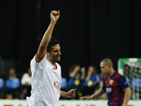 Kairat's forward Humberto (C) celebrates his goal during the UEFA Futsal Cup, final match between Kairat Almaty and FC Barcelona at the Meo...