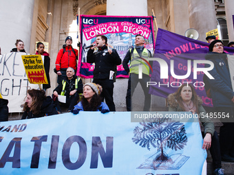 Members and supporters of the striking University and College Union (UCU) rally outside the Royal Exchange at Bank Junction following its 'M...