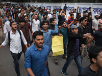 Students protest a rally against the violence of Modi Govt. at Raju Memorial Sculpture near Dhaka University in Dhaka, Bangladesh on Wednesd...