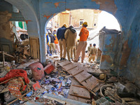 Rescue work underway after a two-storey building collapsed following a cylinder blast near Tarkeshwar Temple, in Jaipur, Rajasthan, India, o...
