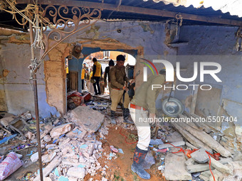 Rescue work underway after a two-storey building collapsed following a cylinder blast near Tarkeshwar Temple, in Jaipur, Rajasthan, India, o...