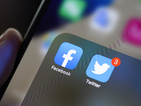 Facebook and Twitter applications are seen on an Apple iPhone 11 Pro Max in The Hague, The Netherlands on March 2, 2020. (