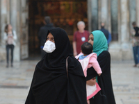 A visitor wearing a protective mask outside the Church of the Holy Sepulchre in Jerusalem's Old City.
With the total to 42 Israelis tested p...