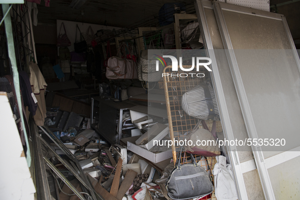 Clothes and bags are abandoned at a destroyed boutique in Futaba, Fukushima prefecture at 10 March 2020. 