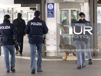 Italian National Police officers patrol on March 10, 2020 at the Padua train station following new Italian government measures to contain Co...